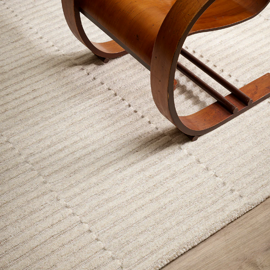 Anni wool rug in natural sand tone with textured linear pattern
