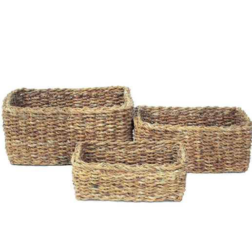 Three woven baskets of different sizes on a white background. Sea Grass