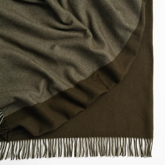 Shop the Fiord wool throw 130x190cm – lightweight, 100% wool with a contemporary Biscuit and Caramel two-tone panel design, perfect for warmth, style, and gifting.