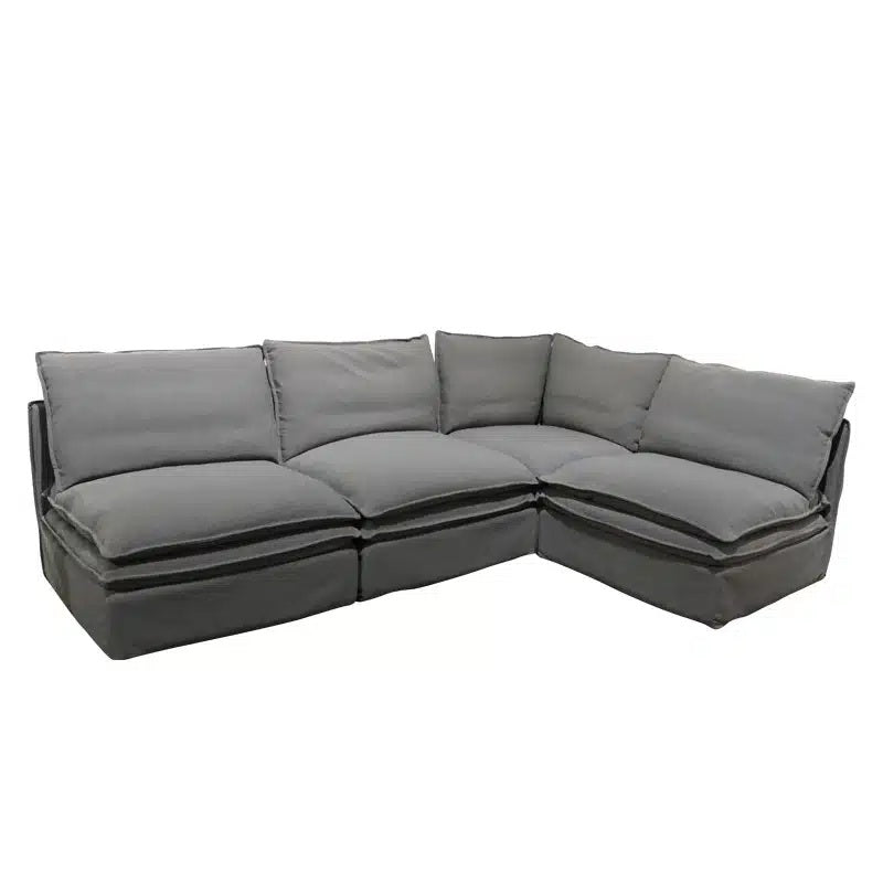 A spacious sectional sofa in a versatile grey linen blend, designed for relaxed comfort and modern living.