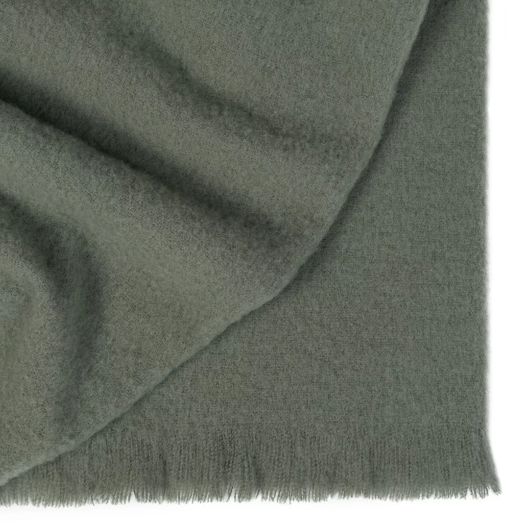 Shop the Hyde wool blend throw 130x200cm – New Zealand made with plush brushed texture and tassel fringe, soft, tactile, and perfect for gifting.