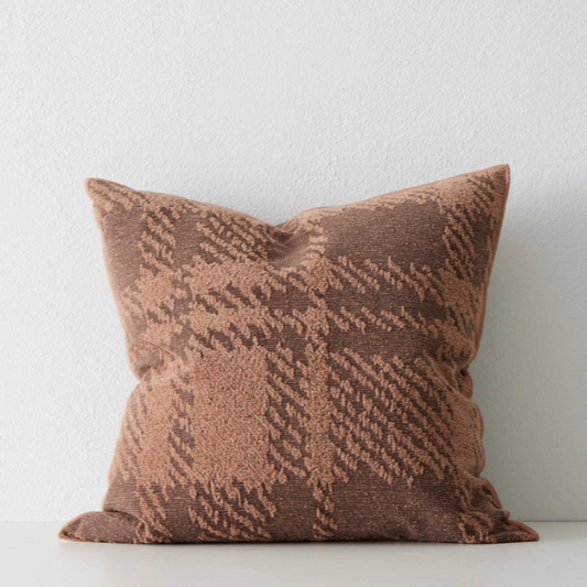 Textured decorative cushion in neutral tones for sofas or beds