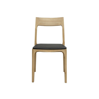 A sleek, stackable dining chair combining contemporary design with versatile upholstery options in leather or fabric.