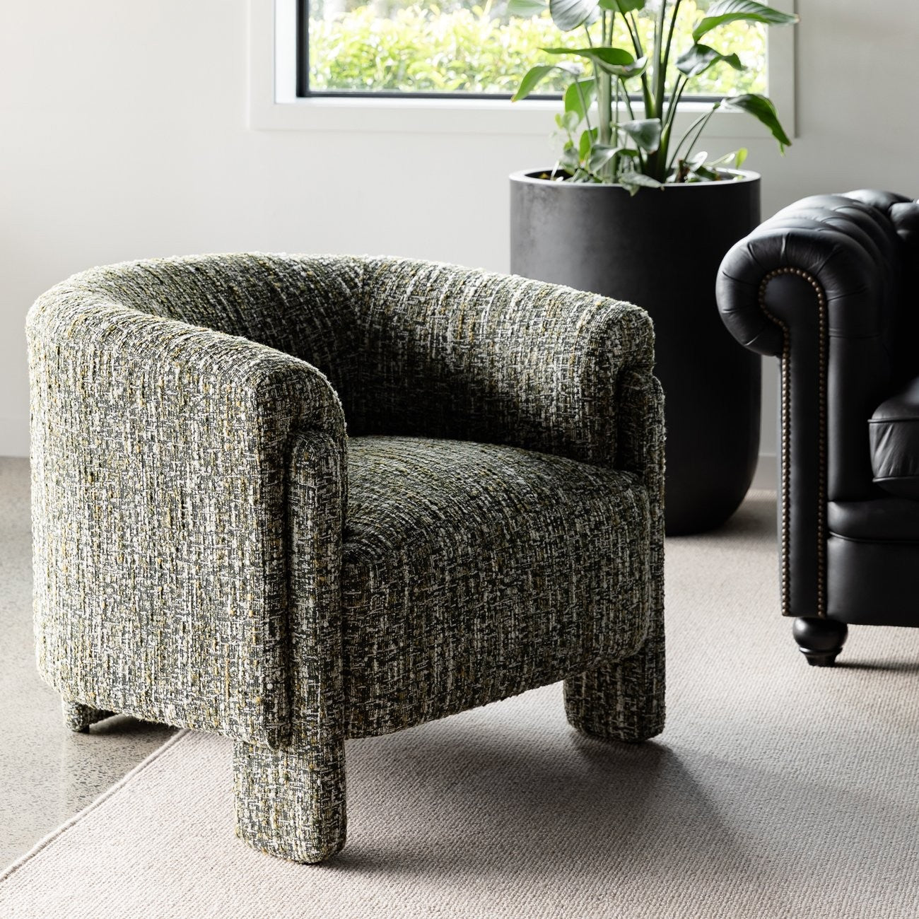 Kelston Occasional Chair with padded back and arms and contemporary design