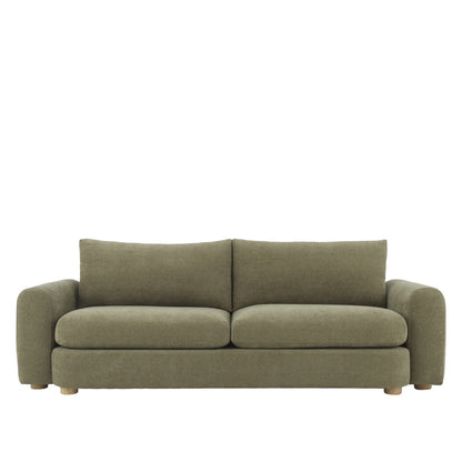 A generously scaled sofa with soft structure, deep comfort, and a richly textured chenille finish.