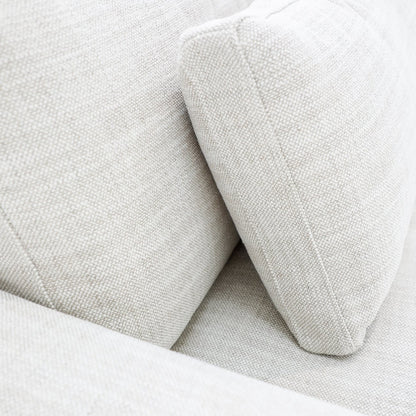 A luxurious modular sofa designed for cloud-like comfort, featuring deep seating, feather-filled cushions, and a flexible five-piece configuration.