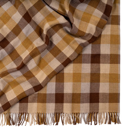 Shop the Caldwell Merino lambswool throw 145x200cm – lightweight, soft, and warm with a timeless plaid design, perfect for year-round comfort and gifting.