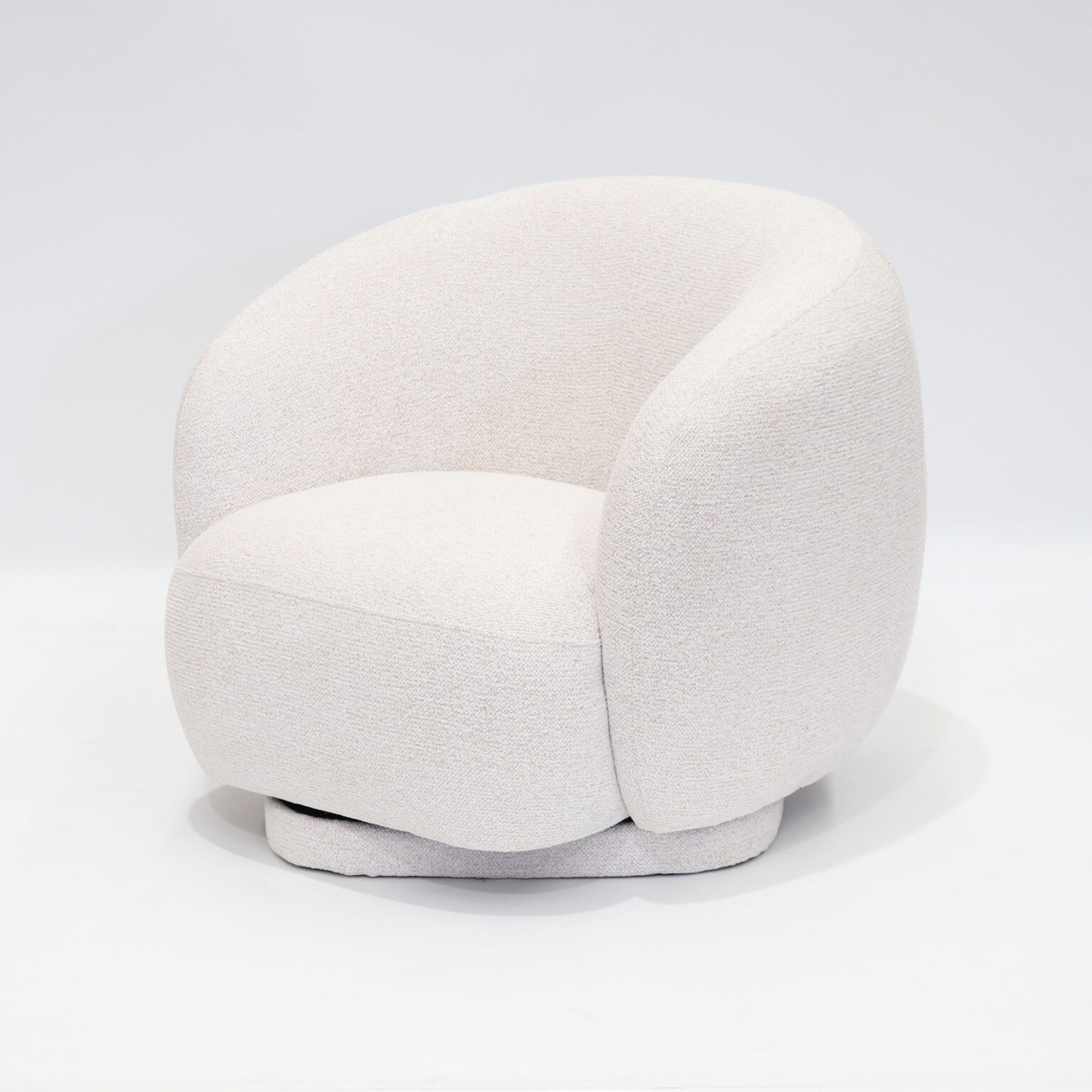 A soft, contemporary occasional chair in a warm cream tone, designed to bring comfort and understated elegance to any space.