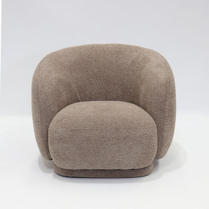 A soft, contemporary occasional chair in a warm cream tone, designed to bring comfort and understated elegance to any space.