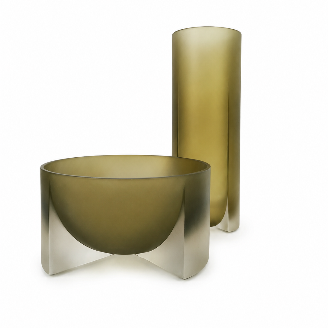Create a beautifully styled home with this Frosted Green Resin Vase and Bowl Set. Featuring contemporary sculptural designs and a soft translucent finish, this decorative duo is perfect for modern interiors.