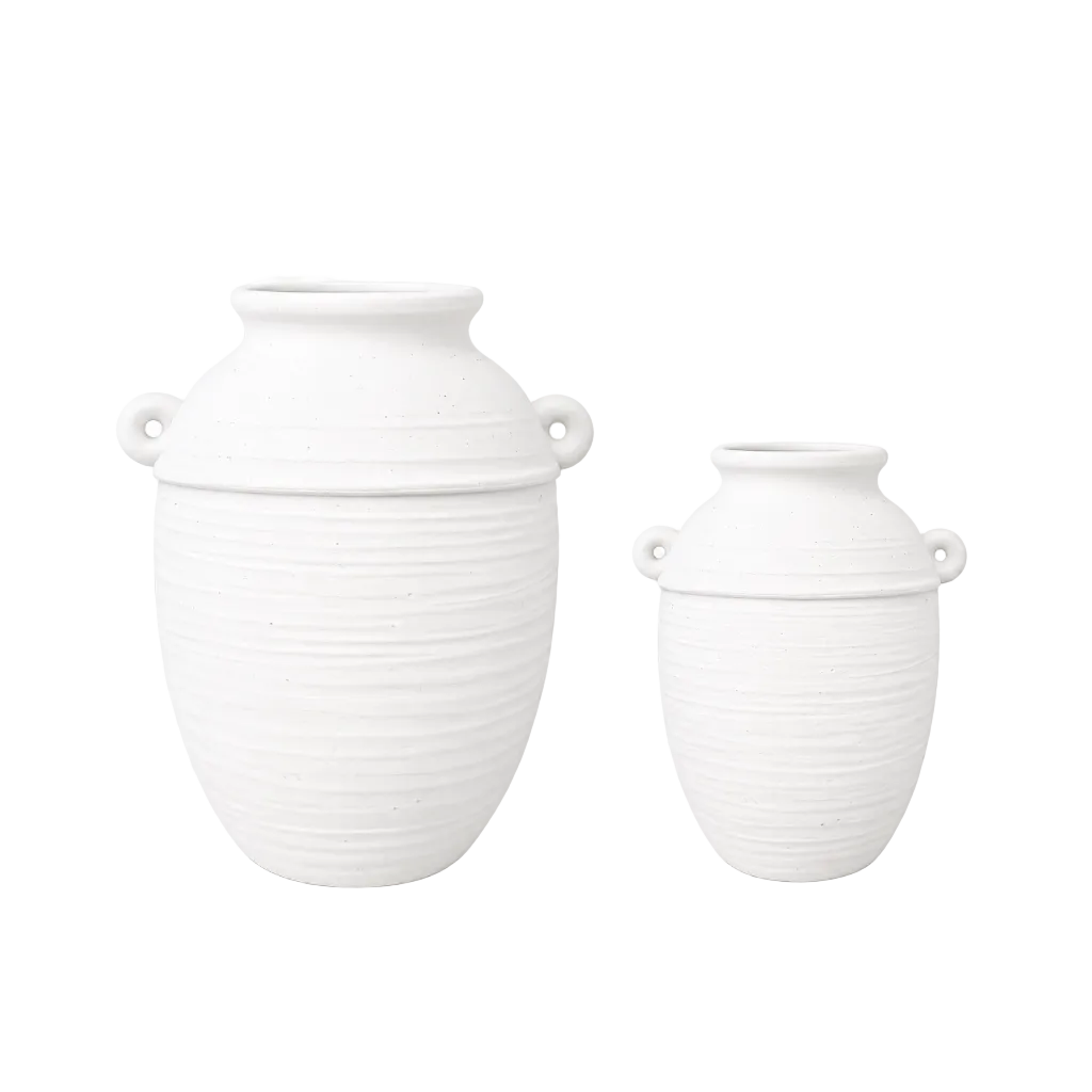 A beautifully crafted terracotta urn with a textured sand finish, designed to bring natural warmth and timeless character to any interior.