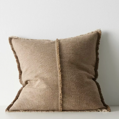 Shop the Adela cushion in 50x50cm or 40x60cm – a linen-cotton blend with textured weave and raw fringe detailing, perfect for layered contemporary styling.
