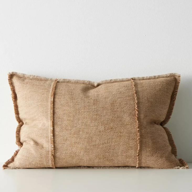 Shop the Adela cushion in 50x50cm or 40x60cm – a linen-cotton blend with textured weave and raw fringe detailing, perfect for layered contemporary styling.