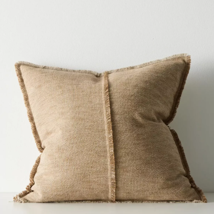 Shop the Adela cushion in 50x50cm or 40x60cm – a linen-cotton blend with textured weave and raw fringe detailing, perfect for layered contemporary styling.