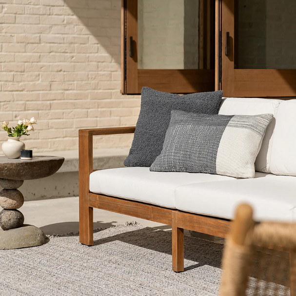 Textured cushion suitable for indoor and outdoor settings