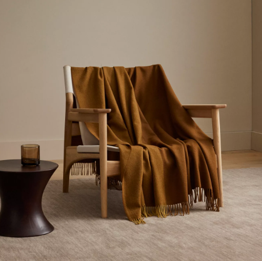 Shop the Fiord wool throw 130x190cm – lightweight, 100% wool with a contemporary Biscuit and Caramel two-tone panel design, perfect for warmth, style, and gifting.