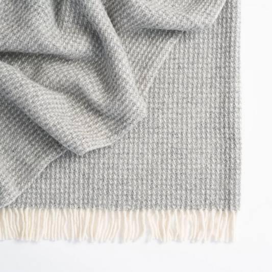 Shop the Breckon wool throw 140x240cm – a soft 100% New Zealand wool waffle weave throw, offering texture, warmth, and timeless style for any home.