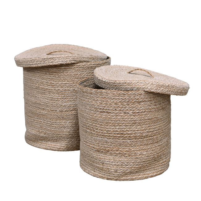 Two woven storage baskets with lids on a white background