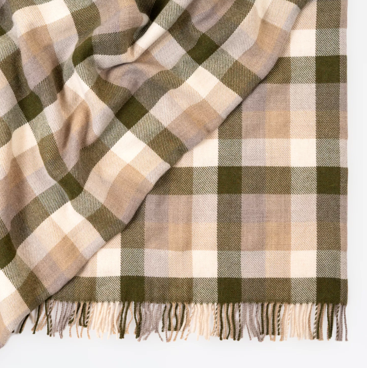 Shop the Caldwell Merino lambswool throw 145x200cm – lightweight, soft, and warm with a timeless plaid design, perfect for year-round comfort and gifting.