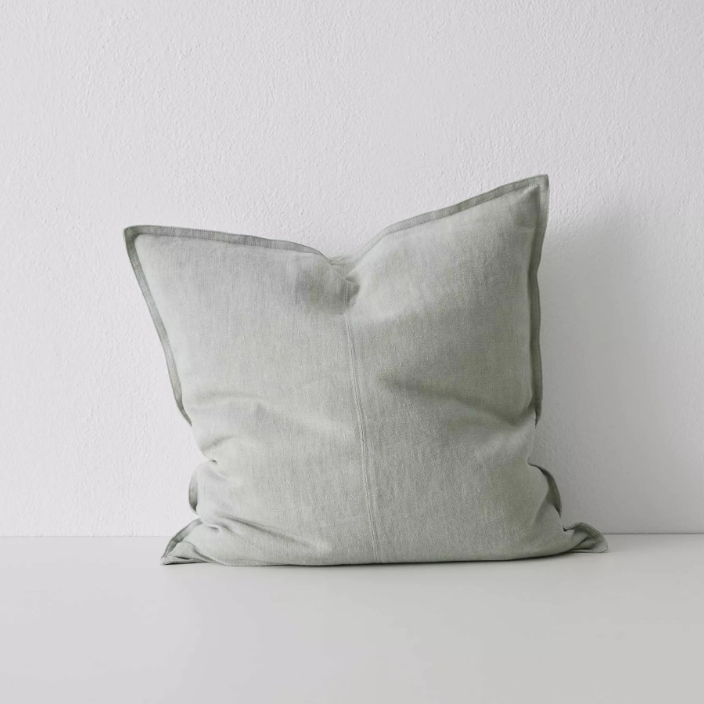 Shop the Como cushion – premium European linen, stonewashed for soft texture, with French seam detailing. Available in 50x50cm, 60x60cm, and 40x60cm lumbar sizes.