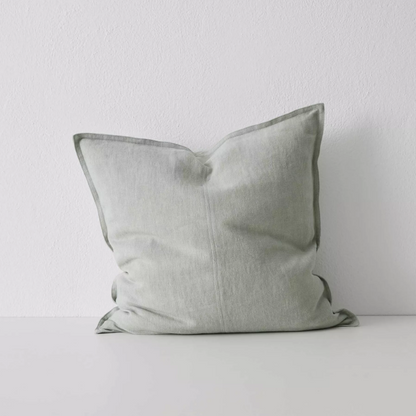Shop the Como cushion – premium European linen, stonewashed for soft texture, with French seam detailing. Available in 50x50cm, 60x60cm, and 40x60cm lumbar sizes.