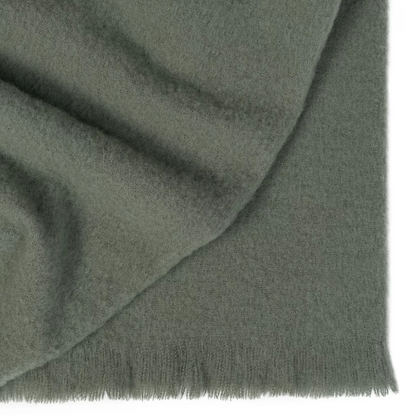 Shop the Hyde wool blend throw 130x200cm – New Zealand made with plush brushed texture and tassel fringe, soft, tactile, and perfect for gifting.