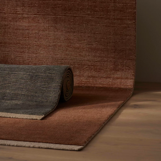 Discover the Remo Rug — 100% New Zealand wool with a high loop horizontal stripe design, cut border, and cotton backing. Available in 4 colours, ideal for contemporary living.