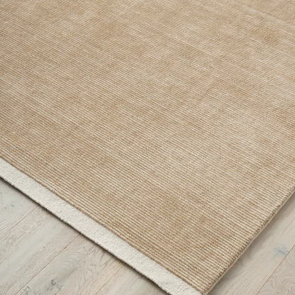 Discover the Remo Rug — 100% New Zealand wool with a high loop horizontal stripe design, cut border, and cotton backing. Available in 4 colours, ideal for contemporary living.