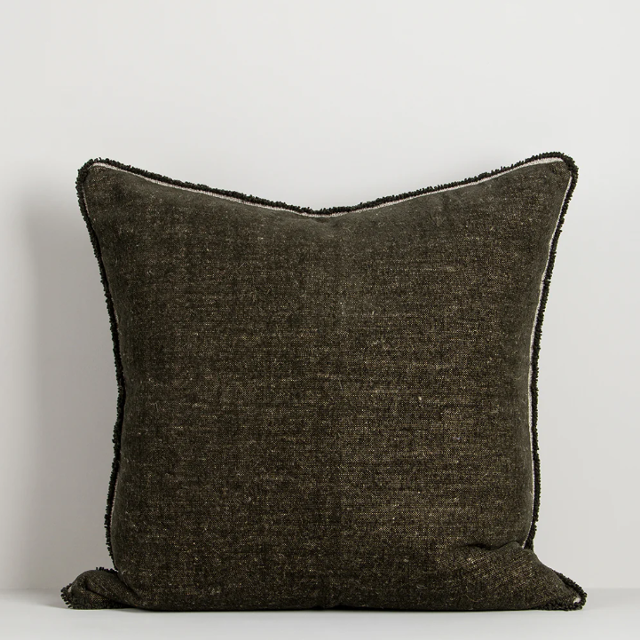 A luxurious cotton-linen chenille cushion featuring a soft velvety texture, refined border detailing, and rich earthy colourways designed to bring warmth and sophistication to contemporary interiors.