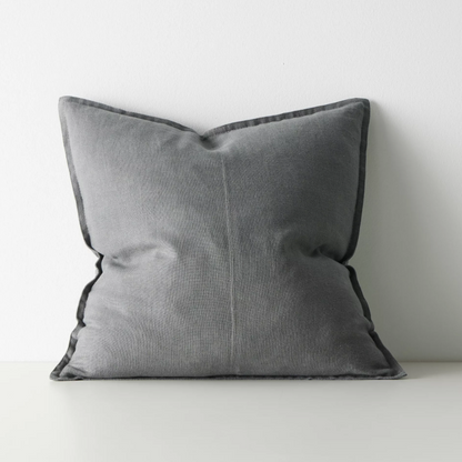 Shop the Como cushion – premium European linen, stonewashed for soft texture, with French seam detailing. Available in 50x50cm, 60x60cm, and 40x60cm lumbar sizes.