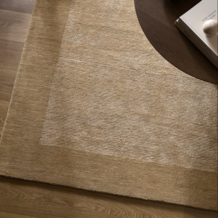 A refined wool and linen rug with subtle striping and a lustrous finish, designed to bring understated elegance to modern interiors.